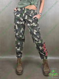 Pantalones estampados militar mujer